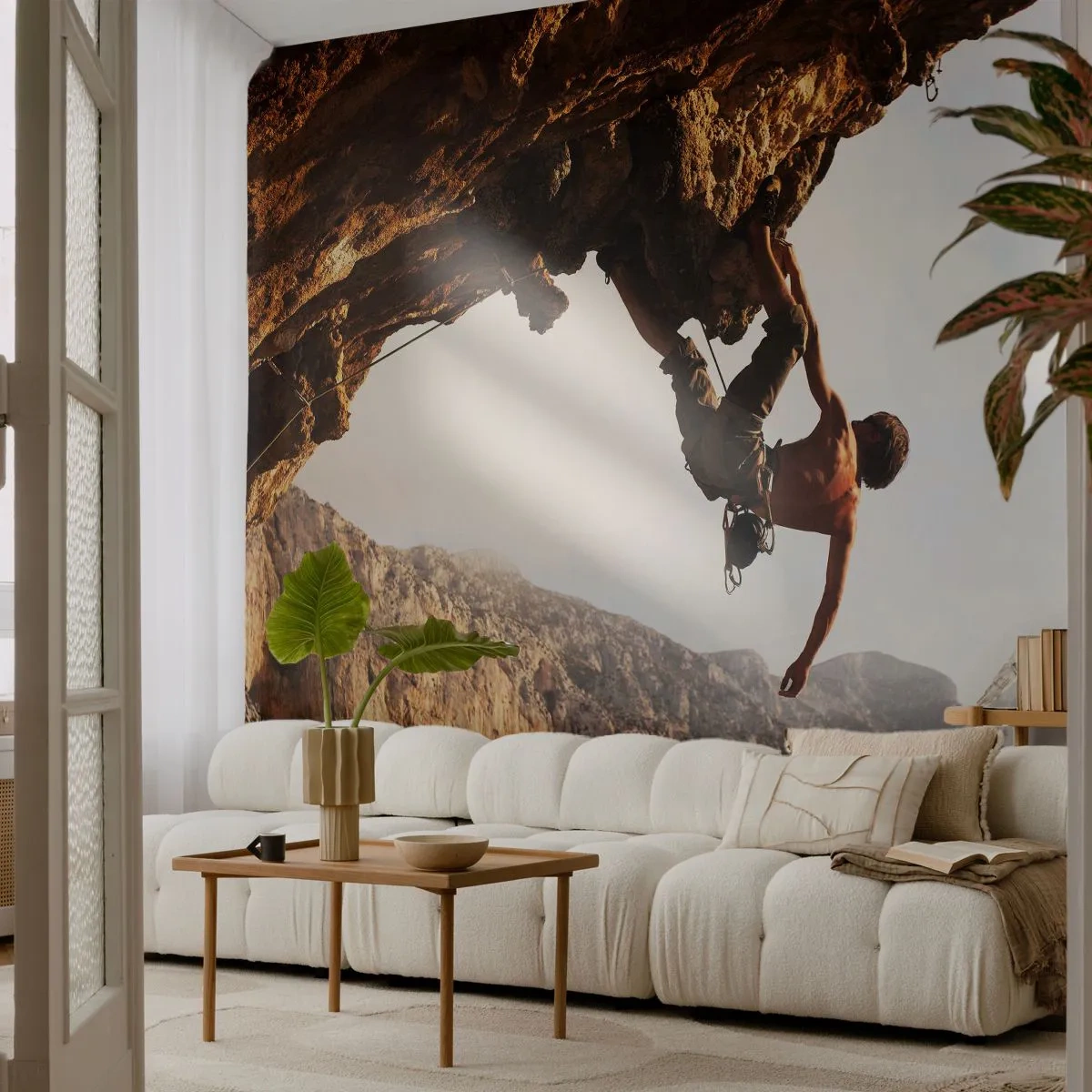 Fototapeta Premium Canvas - Wspinacz na stromym klifie w górach w promieniach słońca - 100x70cm - Świat skurczony w garści na obrywie głazu - Nowoczesna dekoracja ścienna do salonu i sypialni ARTTOR