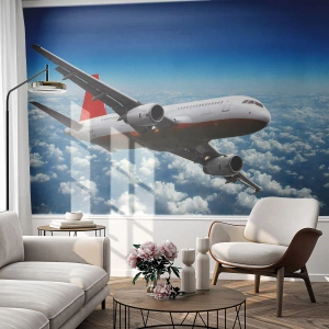 Fototapeta Premium Sand - Samolot pasażerski lecący nad chmurami na tle błękitnego nieba - 100x70cm - Oderwij się od tego wszystkiego - Nowoczesna dekoracja ścienna do salonu, kuchni i sypialni ARTTOR