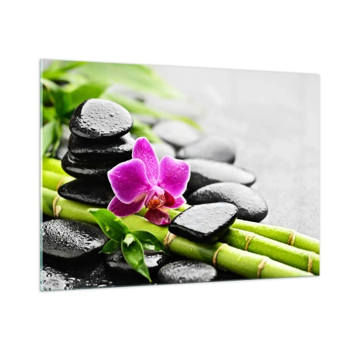 Obraz na szkle - Orchidea, czarne kamienie i bambus w spokojnej aranżacji - 100x70cm - W spokojnej równowadze - Nowoczesna dekoracja ścienna do salonu, kuchni i sypialni ARTTOR