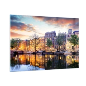 Obraz na szkle - Kanał w Amsterdamie o zachodzie słońca z odbiciem w wodzie - 100x70cm - Powściągliwe i spokojne holenderskie piękno - Nowoczesna dekoracja ścienna do salonu, kuchni i sypialni ARTTOR