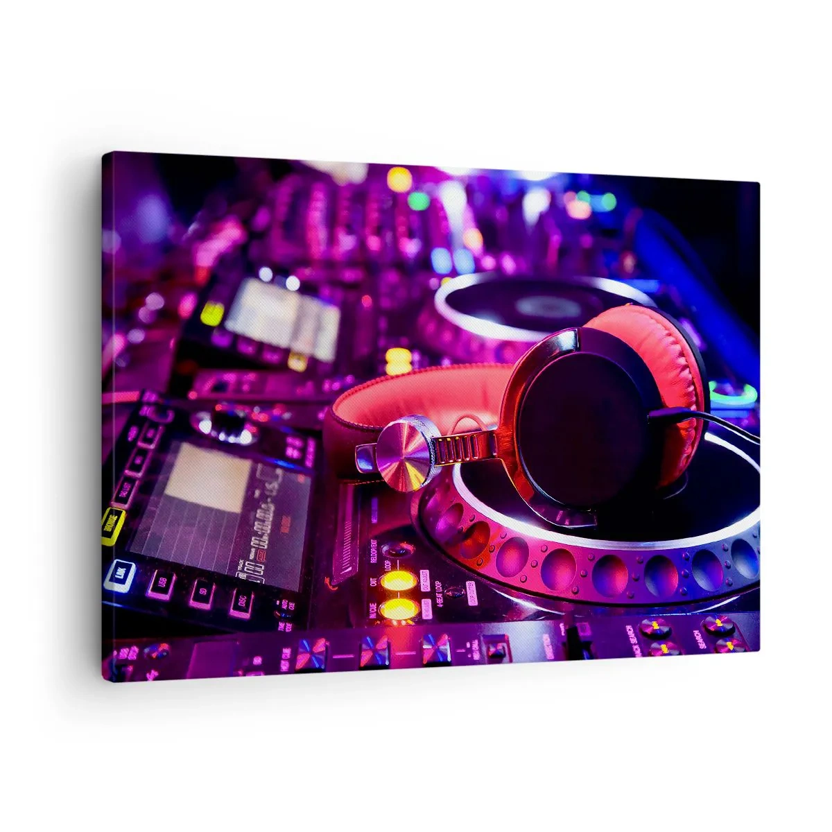Obraz na płótnie - Słuchawki DJ na konsolecie w neonowym oświetleniu - 70x50cm - Zanim się zacznie zabawa - Nowoczesna dekoracja ścienna do salonu i sypialni ARTTOR