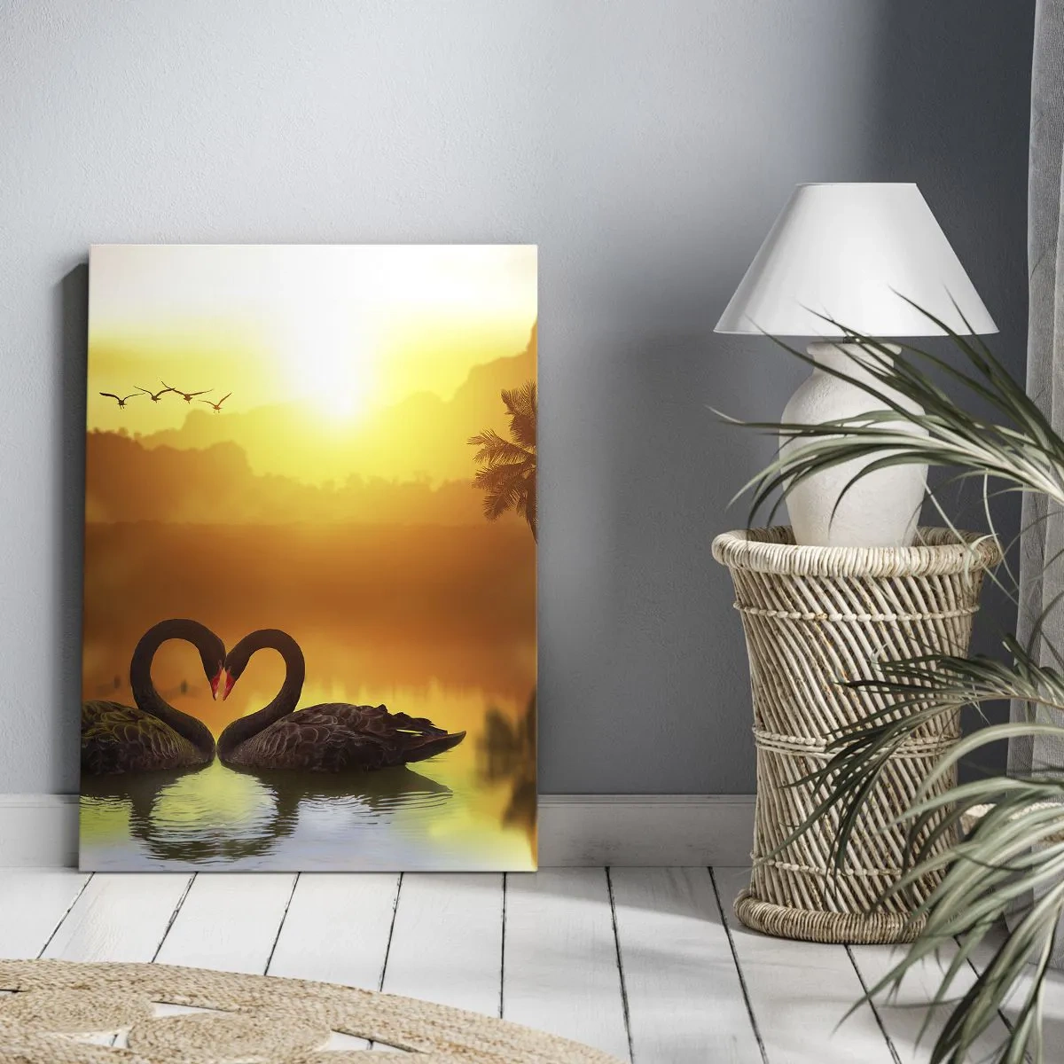 Obraz na płótnie - Dwa czarne łabędzie tworzące serce na tle złocistego zachodu słońca - 50x70cm - Wszystko do pary - Nowoczesna dekoracja ścienna do salonu, kuchni i sypialni ARTTOR