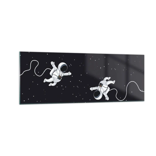 Obraz na szkle - Astronauci unoszący się w kosmosie na tle gwiazd - 140x50cm - Kosmiczny pląs - Nowoczesna dekoracja ścienna do salonu i sypialni ARTTOR