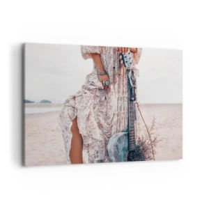 Obraz na płótnie - Kobieta w stylu boho z gitarą na plaży - 120x80cm - Dzieci kwiaty w drodze - Nowoczesna dekoracja ścienna do salonu, kuchni i sypialni ARTTOR
