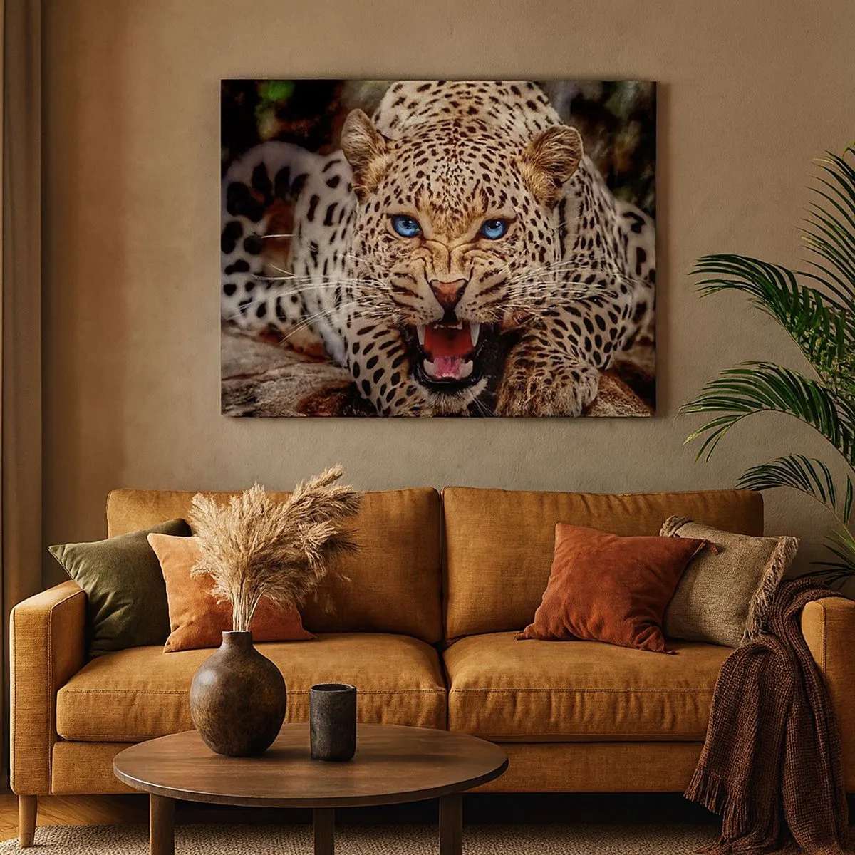 Obraz na płótnie - Groźny leopard z intensywnie błękitnymi oczami - 70x50cm - Złość piękności nie szkodzi - Nowoczesna dekoracja ścienna do salonu i sypialni ARTTOR