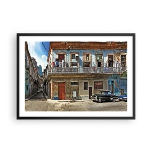 Plakat w czarnej ramie - Kolorowe kamienice i klasyczny samochód w miejskim krajobrazie - 70x50cm - Hawańskie klimaty - Nowoczesna dekoracja ścienna do salonu i sypialni ARTTOR