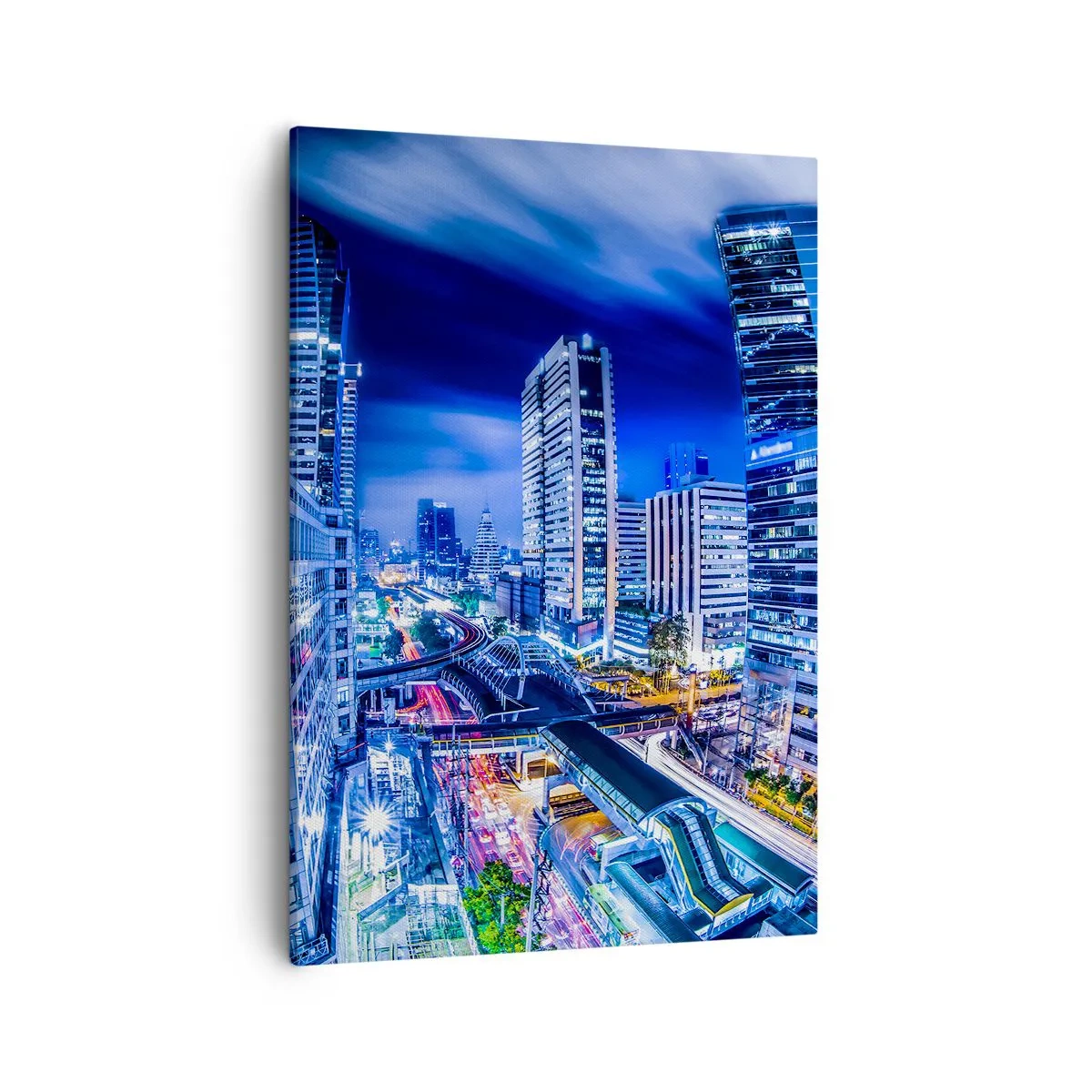 Obraz na płótnie - Widok na nocne miasto z drapaczami chmur i zatłoczoną ulicą - 50x70cm - Rytmy nocnego miasta - Nowoczesna dekoracja ścienna do salonu, kuchni i sypialni ARTTOR