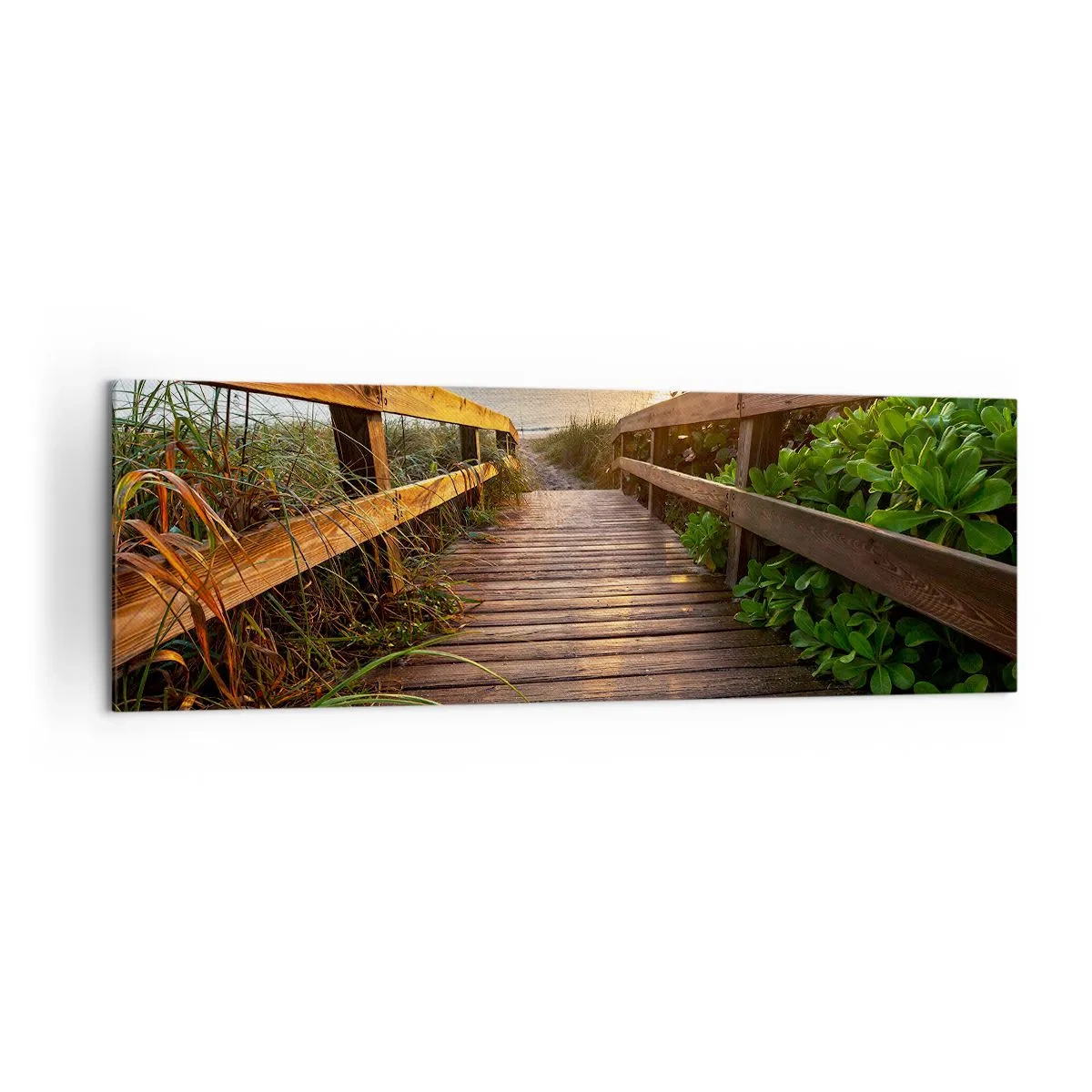 Obraz na płótnie - Drewniany pomost prowadzący na plażę o zachodzie słońca - 160x50cm - I wprost nad brzeg - Nowoczesna dekoracja ścienna do salonu i sypialni ARTTOR