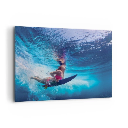 Obraz na płótnie - Surferka pod wodą w dynamicznej kompozycji w odcieniach błękitu - 100x70cm - Głębia radości - Nowoczesna dekoracja ścienna do salonu, kuchni i sypialni ARTTOR
