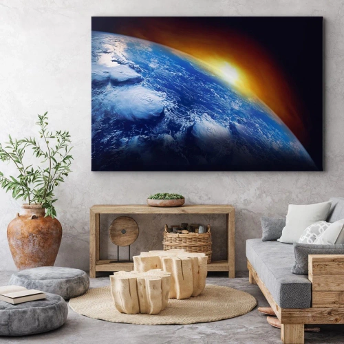 Obraz na płótnie - Wschód słońca nad błękitną planetą - Widok na Ziemię z kosmosu przy zachodzącym słońcu - 70x50cm