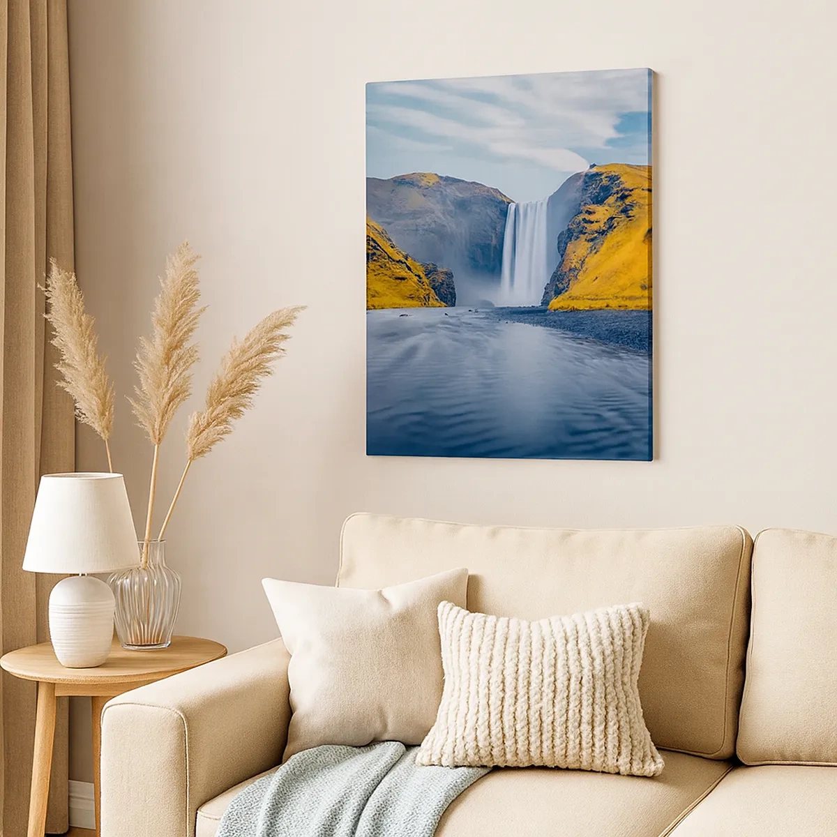 Obraz na płótnie - Wodospad otoczony żółtymi wzgórzami z jeziorem na pierwszym planie - 50x70cm - Wieczne trwanie, wieczny ruch - Nowoczesna dekoracja ścienna do salonu, kuchni i sypialni ARTTOR