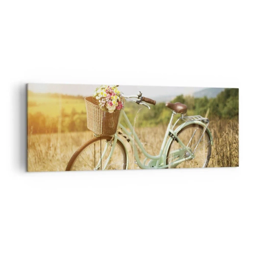 Obraz na płótnie - Retro rower z koszykiem pełnym kwiatów na tle łąki - 140x50cm - Zostanę tu chwilę - Nowoczesna dekoracja ścienna do salonu i sypialni ARTTOR