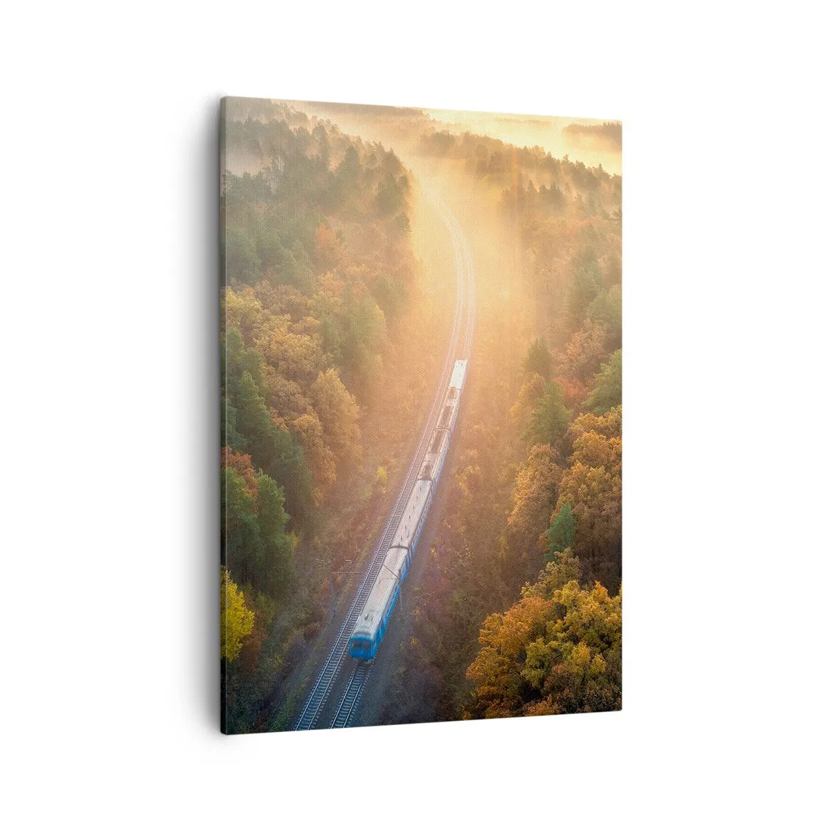 Obraz na płótnie - Pociąg jadący przez jesienny las w promieniach słońca - 50x70cm - Jesienna podróż - Nowoczesna dekoracja ścienna do salonu, kuchni i sypialni ARTTOR