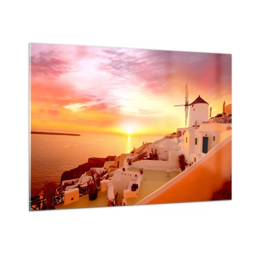 Obraz na szkle - Zachód słońca nad Santorini z białymi budynkami i wiatrakiem - 100x70cm - Rozpłynąć się w bieli i złocie - Nowoczesna dekoracja ścienna do salonu, kuchni i sypialni ARTTOR