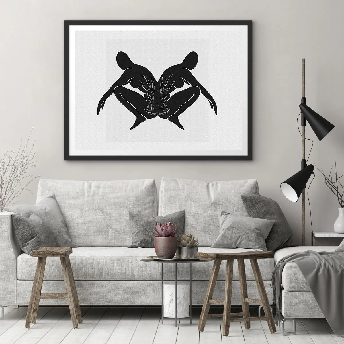 Plakat w czarnej ramie - Czarne sylwetki w symetrycznej pozycji na białym tle - 70x50cm - Wspólna dusza - Nowoczesna dekoracja ścienna do salonu i sypialni ARTTOR