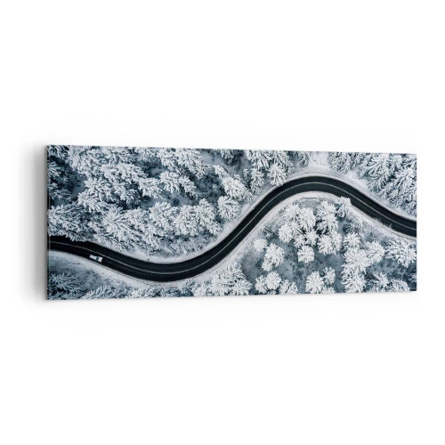 Obraz na płótnie - Zakręcona droga w zimowym lesie z lotu ptaka - 140x50cm - Przez zimowy las - Nowoczesna dekoracja ścienna do salonu i sypialni ARTTOR
