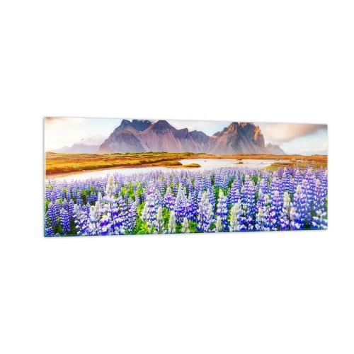 Obraz na szkle - Kwiaty w górskim krajobrazie z malowniczym niebem - 140x50cm - Siła i surowość obok łagodności - Nowoczesna dekoracja ścienna do salonu i sypialni ARTTOR