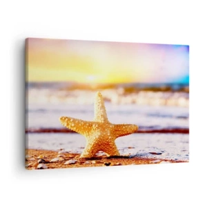 Obraz na płótnie - Rozgwiazda na piaszczystej plaży w blasku zachodzącego słońca - 70x50cm - Morski podarunek - Nowoczesna dekoracja ścienna do salonu i sypialni ARTTOR