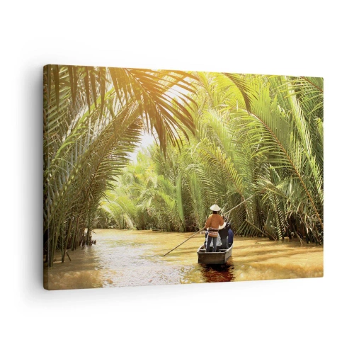 Obraz na płótnie - Palmowym wąwozem - Łódź na rzece otoczona tropikalną roślinnością - 70x50cm
