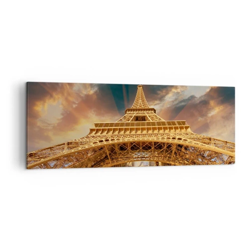 Obraz na płótnie - Wieża Eiffla z perspektywy dolnej na tle zachodzącego słońca - 140x50cm - Jak ludzkość sięgnęła nieba - Nowoczesna dekoracja ścienna do salonu i sypialni ARTTOR