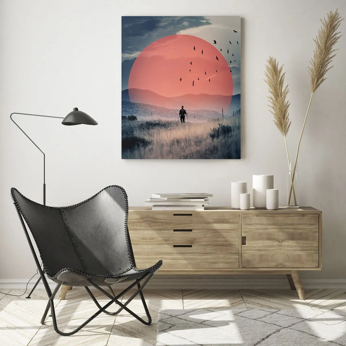 Obraz na szkle - Sylwetka mężczyzny na polu z wielkim czerwonym słońcem w tle - 70x100cm - W swoich żywiołach - Nowoczesna dekoracja ścienna do salonu i sypialni ARTTOR