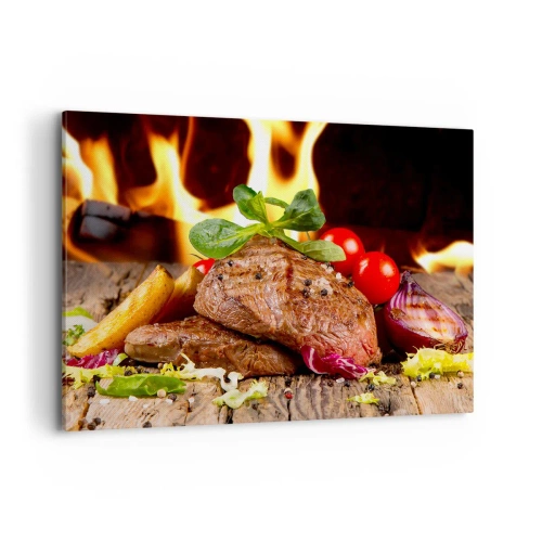Obraz na płótnie - Grillowany stek z dodatkami na tle płomieni - 100x70cm - Wyczarowane żarem - Nowoczesna dekoracja ścienna do salonu, kuchni i sypialni ARTTOR