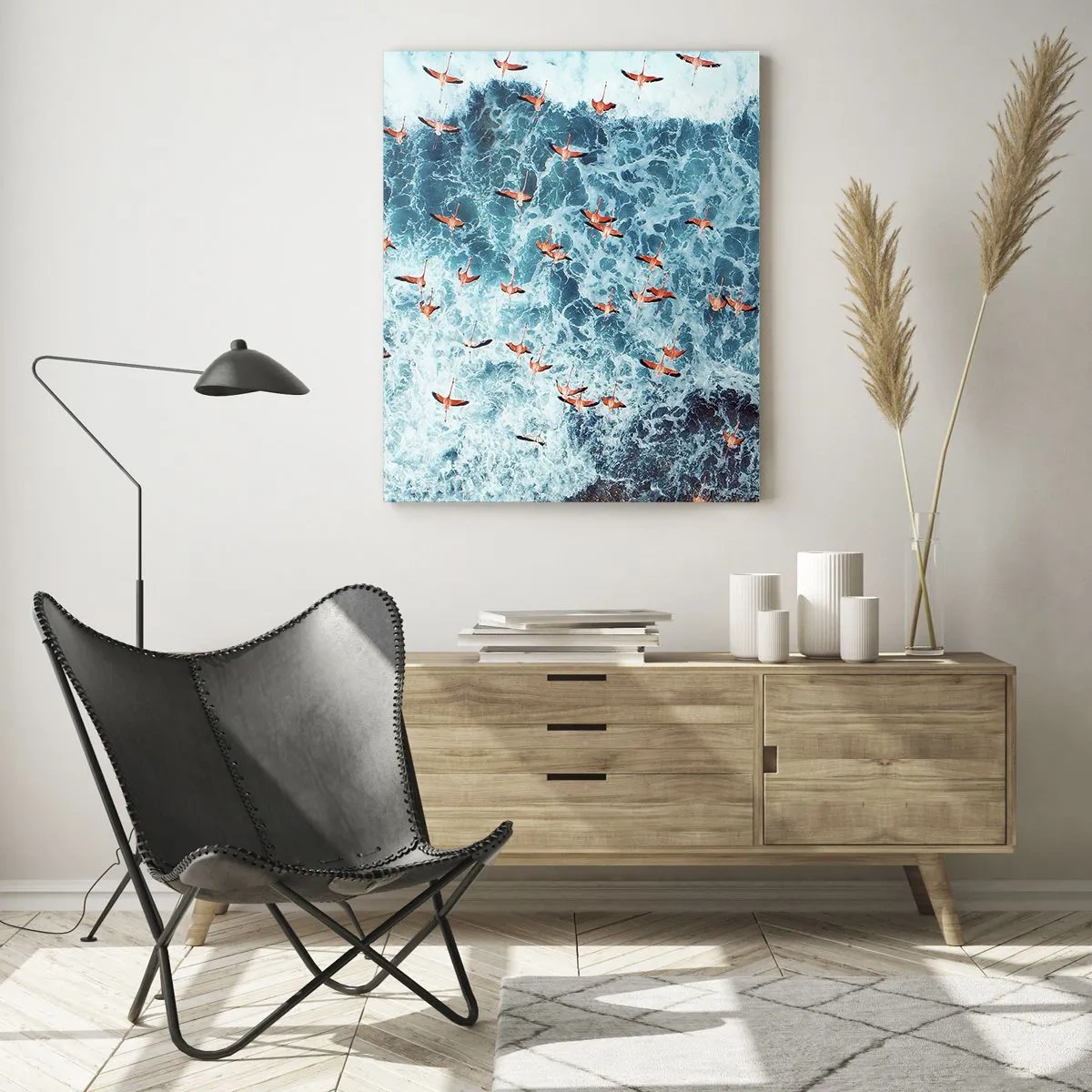 Obraz na szkle - Różowe flamingi nad błękitnym oceanem z lotu ptaka - 80x120cm - Nadmorska parada - Nowoczesna dekoracja ścienna do salonu i sypialni ARTTOR