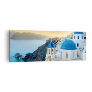 Obraz na płótnie - Widok na Santorini z białymi budynkami i błękitnym morzem - 140x50cm - Santorini - przytulone do skał - Nowoczesna dekoracja ścienna do salonu i sypialni ARTTOR