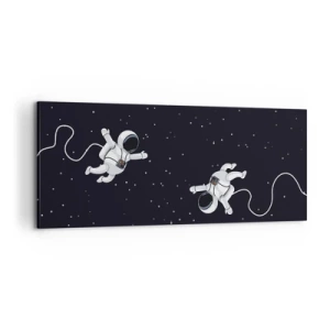 Obraz na płótnie - Astronauci unoszący się w kosmosie na tle gwiazd - 120x50cm - Kosmiczny pląs - Nowoczesna dekoracja ścienna do salonu i sypialni ARTTOR