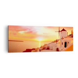 Obraz na płótnie - Santorini o zachodzie słońca z wiatrakiem - 140x50cm - Rozpłynąć się w bieli i złocie - Nowoczesna dekoracja ścienna do salonu i sypialni ARTTOR