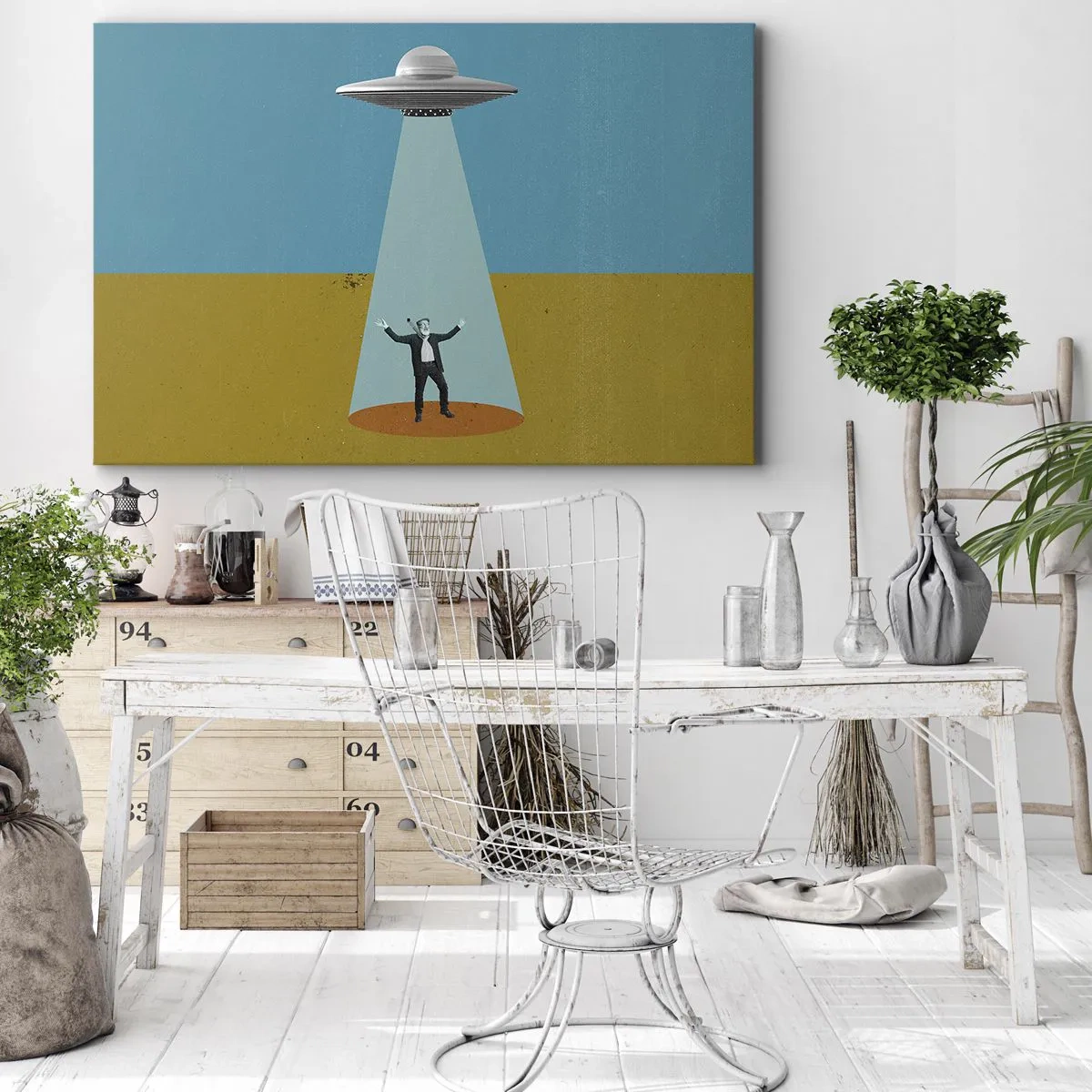 Obraz na płótnie - Człowiek w świetle UFO na tle kolorowego pejzażu - 70x50cm - Bliskie spotkanie - Nowoczesna dekoracja ścienna do salonu i sypialni ARTTOR