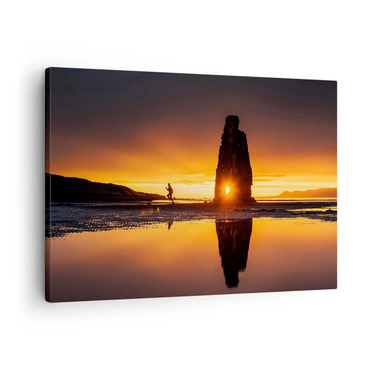 Obraz na płótnie - Osoba biegnąca na plaży o zachodzie słońca z formacją skalną - 70x50cm - Tylko ty i natura - Nowoczesna dekoracja ścienna do salonu i sypialni ARTTOR