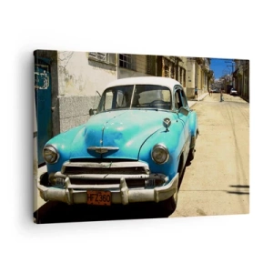Obraz na płótnie - Niebieski klasyczny samochód na ulicy w słoneczny dzień - 70x50cm - Evviva Cuba! - Nowoczesna dekoracja ścienna do salonu i sypialni ARTTOR