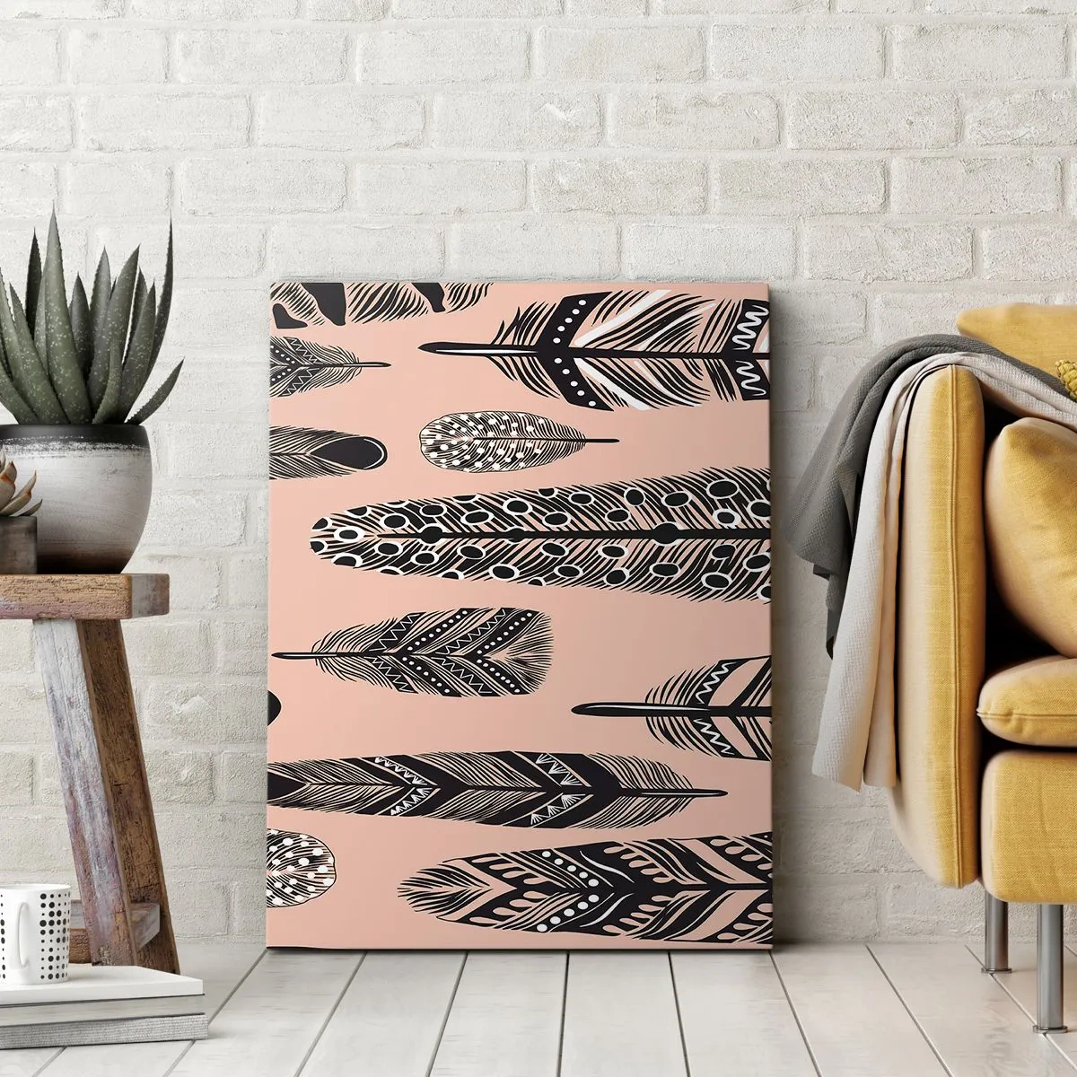 Obraz na płótnie - Czarne pióra z etnicznymi wzorami na beżowym tle - 50x70cm - Indiańska kolekcja - Nowoczesna dekoracja ścienna do salonu, kuchni i sypialni ARTTOR