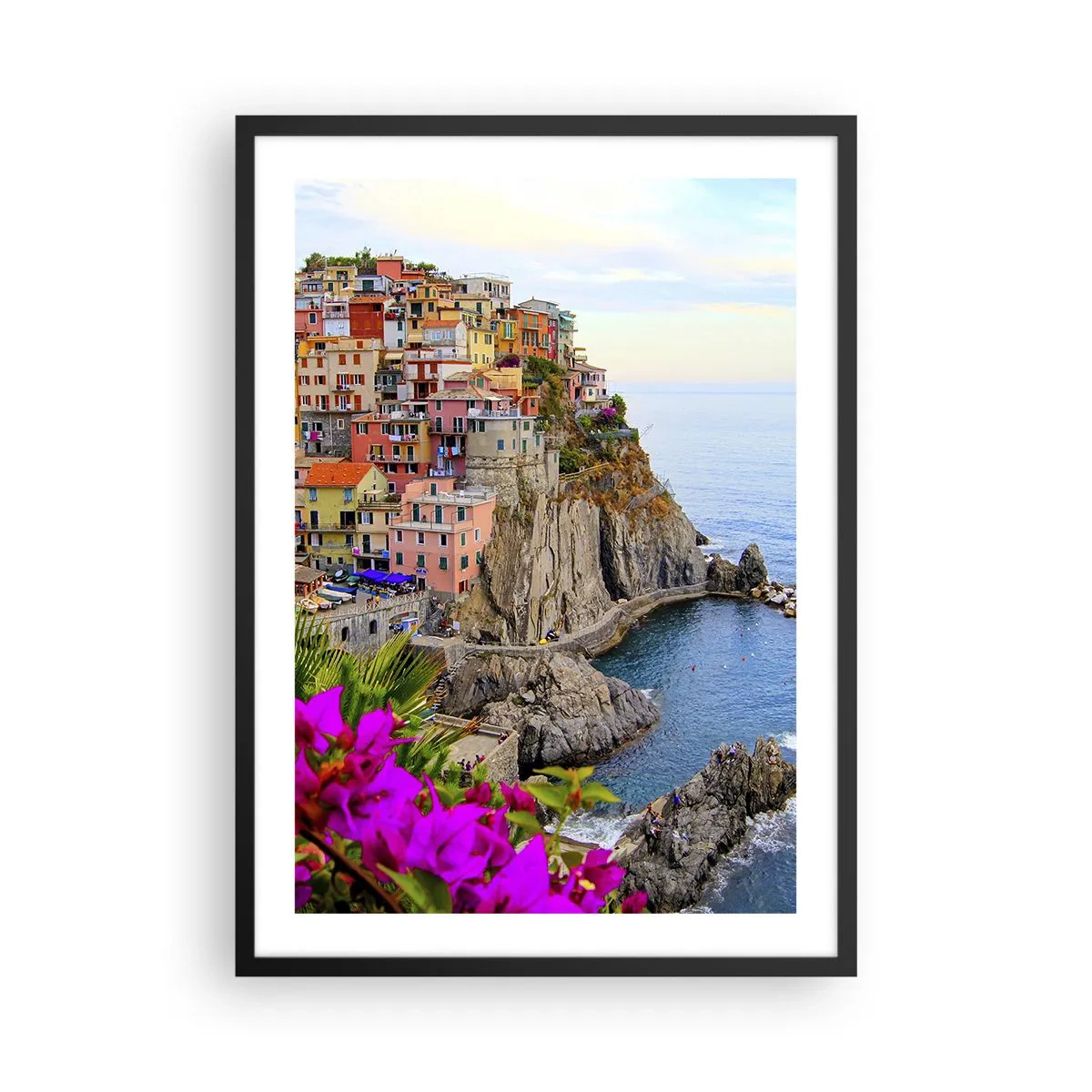 Plakat w czarnej ramie - Widok na kolorowe budynki przy klifie nad morzem - 50x70cm - Śmiejące się miasto - Nowoczesna dekoracja ścienna do salonu i sypialni ARTTOR