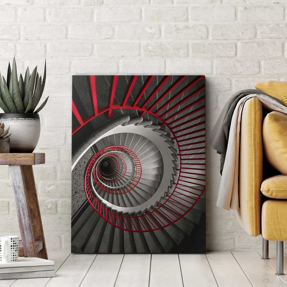 Obraz na płótnie - Spiralne schody z czerwonymi poręczami w czarno-białej kolorystyce - 50x70cm - Zabawy architektury - Nowoczesna dekoracja ścienna do salonu, kuchni i sypialni ARTTOR