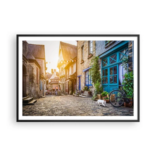 Plakat w czarnej ramie - Urokliwa uliczka z kamiennym brukiem w świetle słońca - 100x70cm - Biały duch miasteczka - Nowoczesna dekoracja ścienna do salonu i sypialni ARTTOR