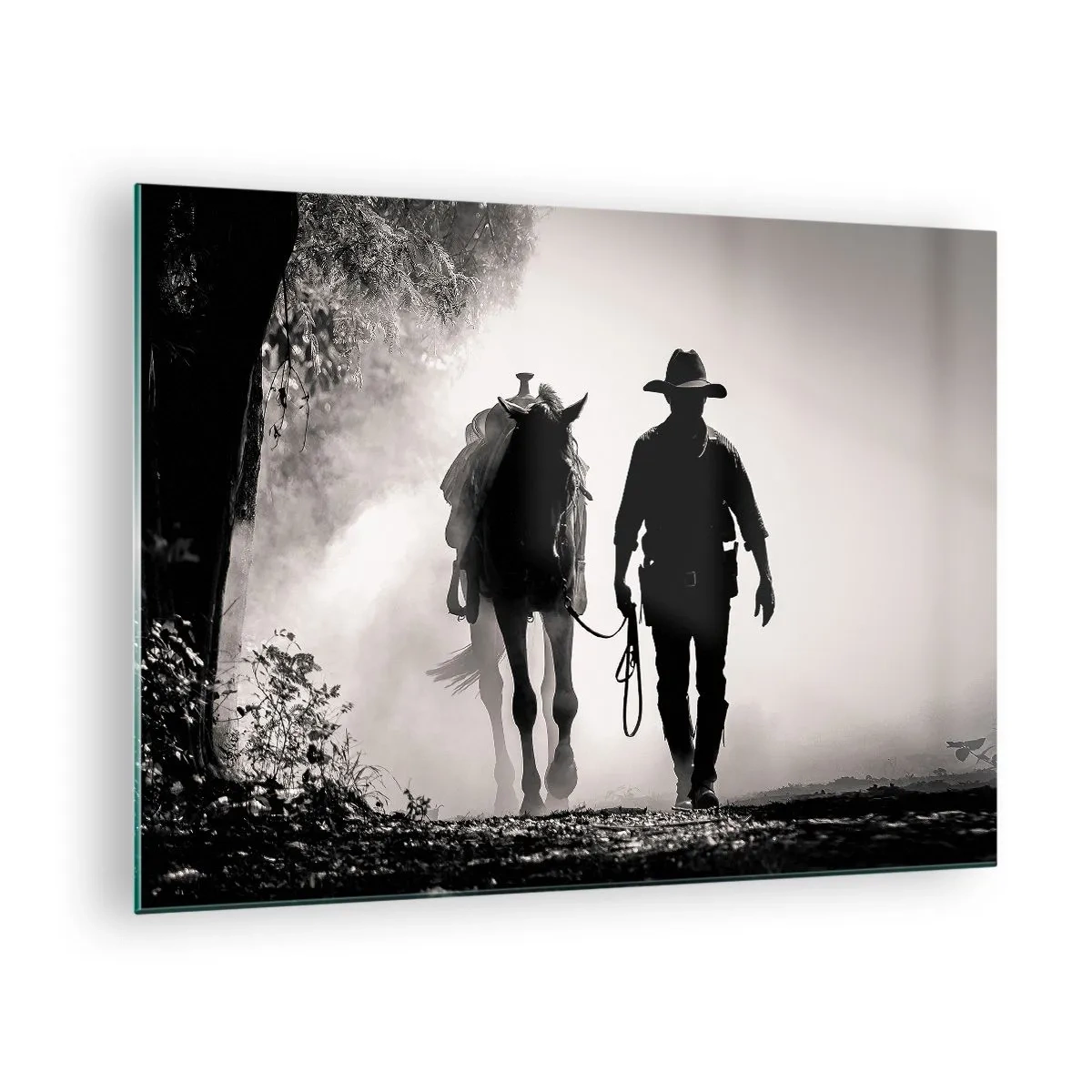 Obraz na szkle - Silhouette of a cowboy leading a horse through a misty landscape - 70x50cm - Teksański poranek - Nowoczesna dekoracja ścienna do salonu i sypialni ARTTOR