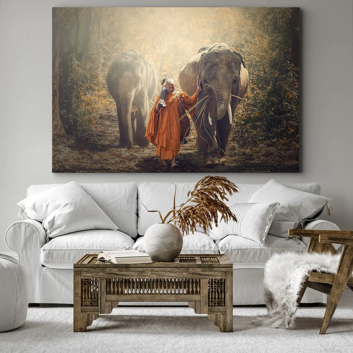 Obraz na płótnie - Mnich w pomarańczowej szacie prowadzący słonia w lesie - 70x50cm - Pełne zrozumienie - Nowoczesna dekoracja ścienna do salonu i sypialni ARTTOR