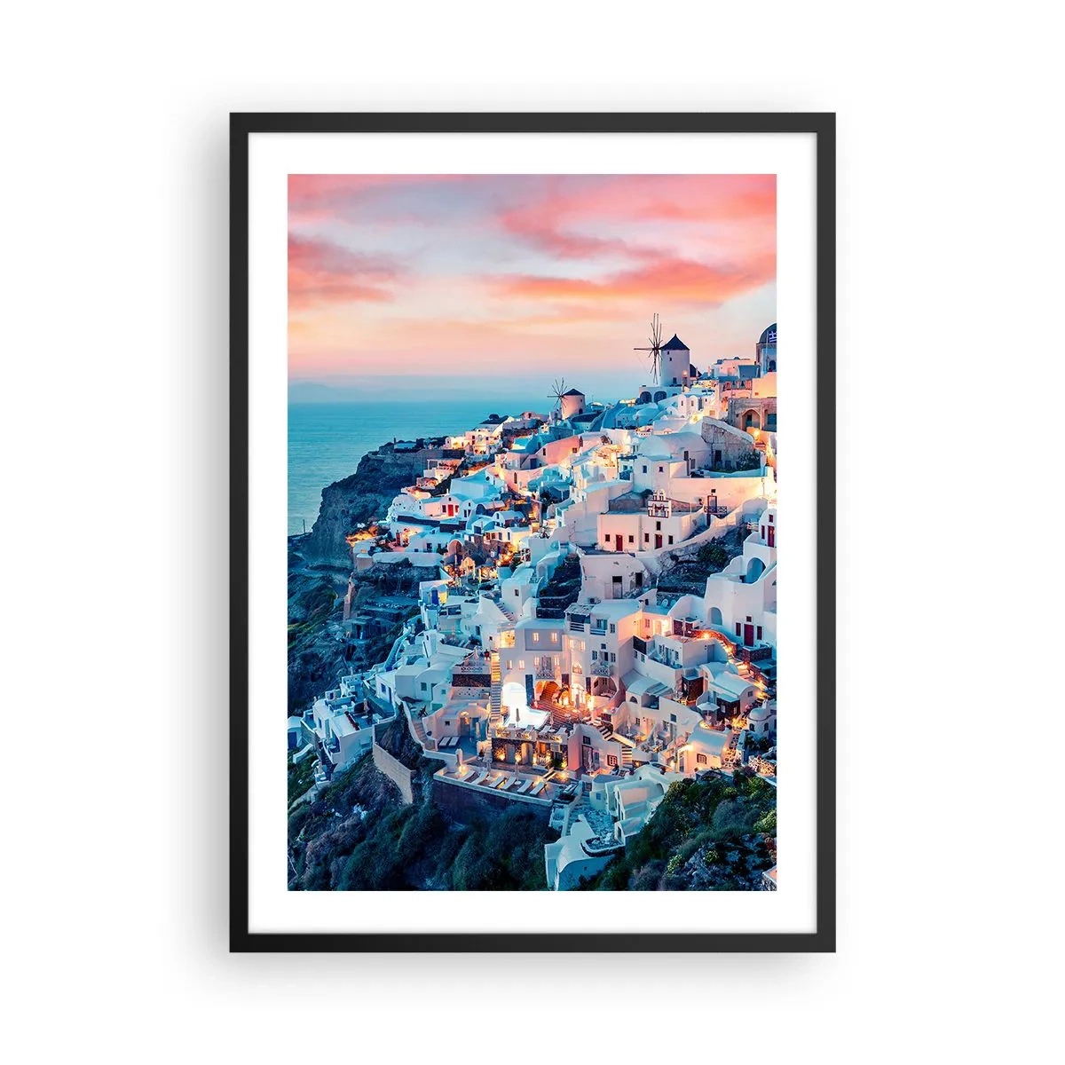 Plakat w czarnej ramie - Malowniczy widok na oświetlone domy na Santorini o zachodzie słońca - 50x70cm - Twoje wielkie greckie wakacje - Nowoczesna dekoracja ścienna do salonu i sypialni ARTTOR
