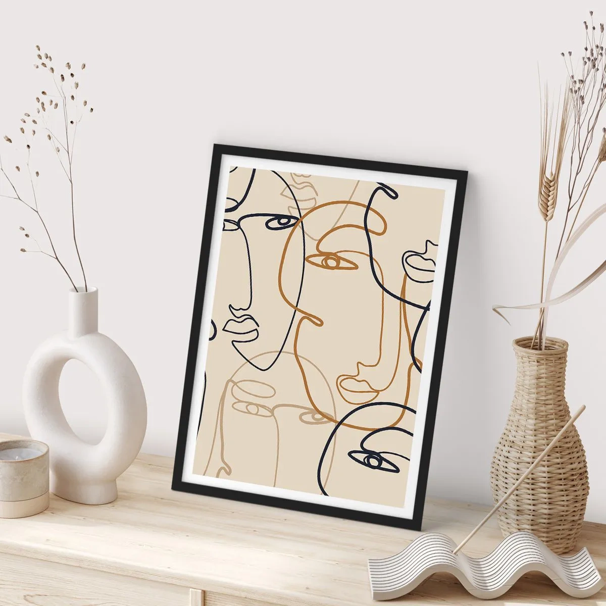 Plakat w czarnej ramie - Minimalistyczne rysunki twarzy na beżowym tle - 50x70cm - Portret zwielokrotniony - Nowoczesna dekoracja ścienna do salonu i sypialni ARTTOR