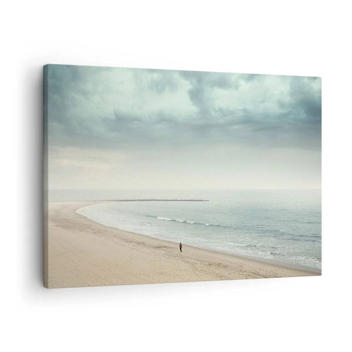 Obraz na płótnie - Samotna postać na opustoszałej plaży przy spokojnym morzu - 70x50cm - w poszukiwaniu spokoju - Nowoczesna dekoracja ścienna do salonu i sypialni ARTTOR