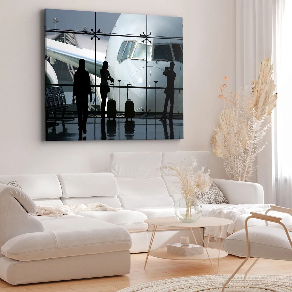 Obraz na płótnie - Lotnisko z sylwetkami ludzi i widokiem na samolot - 100x70cm - Vis a vis na lotnisku - Nowoczesna dekoracja ścienna do salonu, kuchni i sypialni ARTTOR