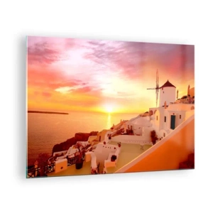 Obraz na szkle - Zachód słońca nad Santorini z białymi budynkami i wiatrakiem - 70x50cm - Rozpłynąć się w bieli i złocie - Nowoczesna dekoracja ścienna do salonu i sypialni ARTTOR