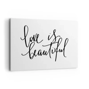 Obraz na płótnie - Czarny napis love is beautiful na białym tle - 100x70cm - Czytaj i powtarzaj - Nowoczesna dekoracja ścienna do salonu, kuchni i sypialni ARTTOR