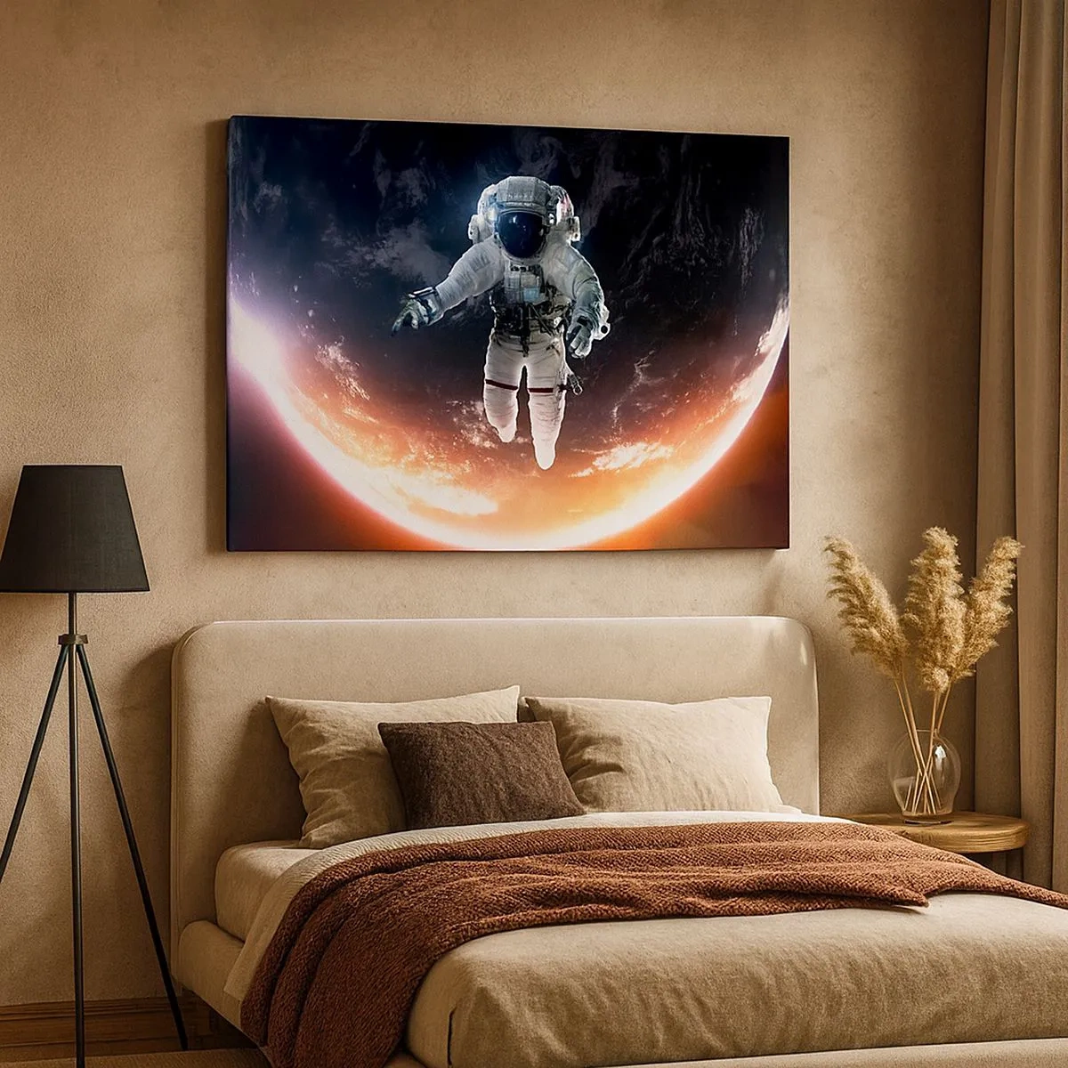 Obraz na płótnie - Astronauta unoszący się nad Ziemią oświetloną słońcem - 70x50cm - Mogę zostać jeszcze chwilę? - Nowoczesna dekoracja ścienna do salonu i sypialni ARTTOR