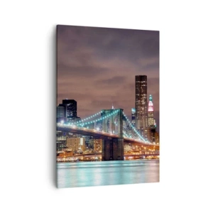 Obraz na płótnie - Brooklyn Bridge z oświetleniem nocnym i panoramą miasta - 50x70cm - Światła wielkiego miasta - Nowoczesna dekoracja ścienna do salonu, kuchni i sypialni ARTTOR