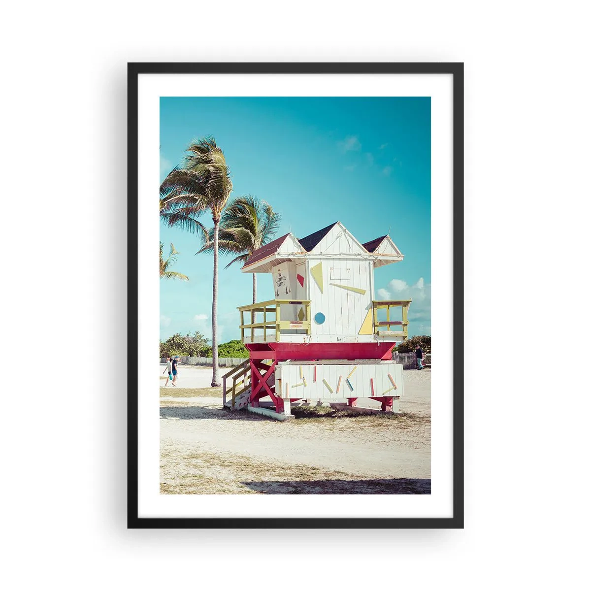 Plakat w czarnej ramie - Kolorowa budka ratownika na plaży z palmami i błękitnym niebem - 50x70cm - Przed tobą piękny dzień - Nowoczesna dekoracja ścienna do salonu i sypialni ARTTOR