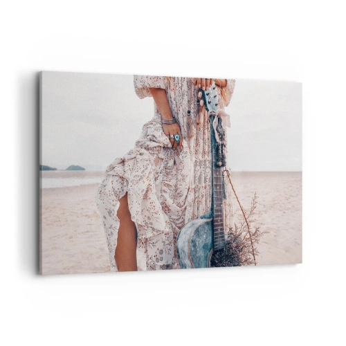 Obraz na płótnie - Kobieta w stylu boho z gitarą na plaży - 120x80cm - Dzieci kwiaty w drodze - Nowoczesna dekoracja ścienna do salonu, kuchni i sypialni ARTTOR