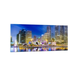 Obraz na szkle - Nocna panorama miasta z odbiciem świateł na wodzie - 120x50cm - Tęczowa noc metropolii - Nowoczesna dekoracja ścienna do salonu i sypialni ARTTOR